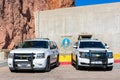 Two Chevrolet SUVs white base model service vehicle wearing U.S. government plates registered to the Department of the Interior