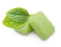 Two chewing gum with mint leaves Royalty Free Stock Photo