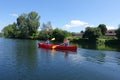 Two children canoing on the River lot Royalty Free Stock Photo