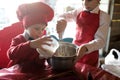 Two children chefs preparing cupcakes Royalty Free Stock Photo