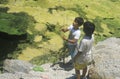 Two children fishing