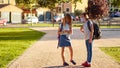 Two children going back to school during covid-19 pandemic. School child wearing protective face mask in school Royalty Free Stock Photo