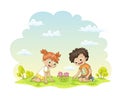 Two children are happy about a flower in a meadow