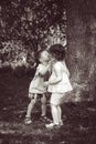 Two children kids hugging kissing Royalty Free Stock Photo