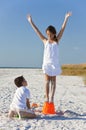 Two Children Making Sandcastles on Beach Royalty Free Stock Photo