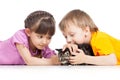 Two children playing with kitten Royalty Free Stock Photo