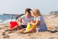 Two children playing with sand Royalty Free Stock Photo