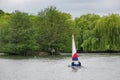 Two children practice sailing on a Spring day in South Norwood l