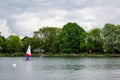 Two children practice sailing on a Spring day in South Norwood l
