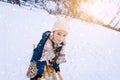 Two children ride on wooden retro sled on sunny winter day. Active winter outdoors games. Winter activities for kids Royalty Free Stock Photo