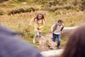 Two Children Running Along Path In Countryside On Winter Vacation Royalty Free Stock Photo