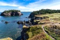 Two children running on a hiking trail along the East Coast of Canada at Chance Cove Newfoundland Royalty Free Stock Photo