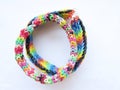 Two children s bright wicker bracelets from multi-colored little erasers isolated object on a white background Royalty Free Stock Photo