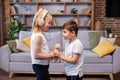 Two children sing song. Concept is childhood, vocal, music, singing. Microphone and headphones Royalty Free Stock Photo