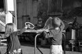 Two children in the square blowing soap bubbles and having fun. Vintage style