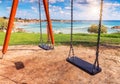 Two children swings Royalty Free Stock Photo