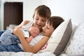 Two children, toddler and his big brother, hugging and kissing t Royalty Free Stock Photo