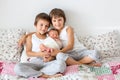 Two children, toddler and his big brother, hugging and kissing t Royalty Free Stock Photo