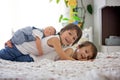 Two children, toddler and his big brother, hugging and kissing t Royalty Free Stock Photo