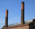 Two chimneys blue sky Royalty Free Stock Photo