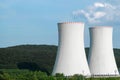 Two chimneys of nuclear power plant near the road Royalty Free Stock Photo