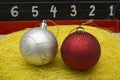 Two Chirstmas's ball close up on yellow thread Royalty Free Stock Photo