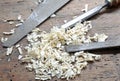 Two chisels and a hand saw with wood shavings in the Workbench Royalty Free Stock Photo