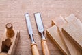 Two chisels old woodworkers plane and wooden Royalty Free Stock Photo