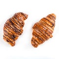 Two chocolate croissant on white background, top view Royalty Free Stock Photo