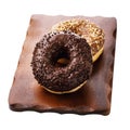 Two chocolate donuts on a stand isolated Royalty Free Stock Photo