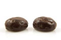 Two chocolate ginger nuts in closeup