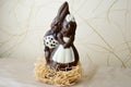 Two chocolate rabbits. Two tasty, embracing, chocolate hares, a loving couple