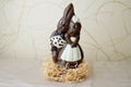 Two chocolate rabbits. Two tasty, embracing, chocolate hares, a loving couple