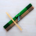 Two chopsticks on bamboo mats Royalty Free Stock Photo