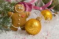 Two christmas balls and the gingerbread man. Holiday decoration Royalty Free Stock Photo