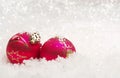 Two Christmas balls in snow Royalty Free Stock Photo