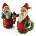 Two christmas figurine of santa claus