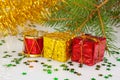 Two Christmas gifts under the Christmas tree Royalty Free Stock Photo