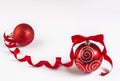 Two Christmas red balls on a white background. Royalty Free Stock Photo