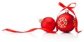 Two Christmas red baubles with ribbon bow isolated on white background Royalty Free Stock Photo