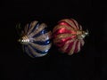 Two Christmas tree balls shaped like an ampoule