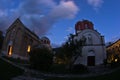 Two churches inside Studenica monastery during evening prayer Royalty Free Stock Photo