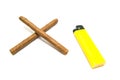 Two cigars and yellow lighter