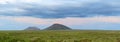 Two dormant shield volcano`s in the desert of south east Idaho.