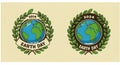 Two circular Earth Day logos, one for 2014 and another for 2024, are displayed side by Royalty Free Stock Photo