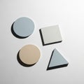 Each shape casts a subtle, soft shadow, indicating overhead lighting Royalty Free Stock Photo