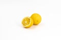 Two citrus fruits a hybrid of orange and lemon yellow color on a white background Royalty Free Stock Photo