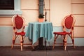 Two classic style chairs and table outdoors Royalty Free Stock Photo