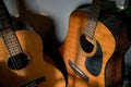 Two classical guitars by the wall Royalty Free Stock Photo