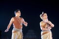 Two Classical Odissi dancers male and female performing Odissi Dance on stage at Konark Temple, Odisha, India. Royalty Free Stock Photo